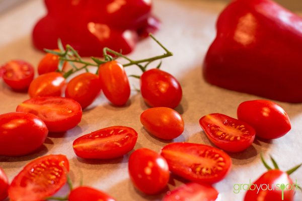 Fresh baby Roma tomatoes and capsicum